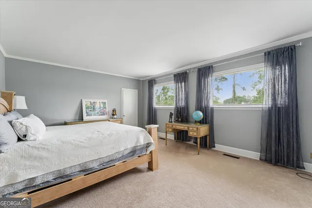 a view of a swimming pool with a lounge chair