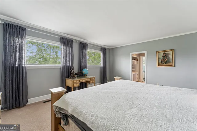 a view of a swimming pool with a yard