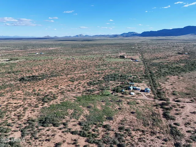 a view of an outdoor space with mountain view