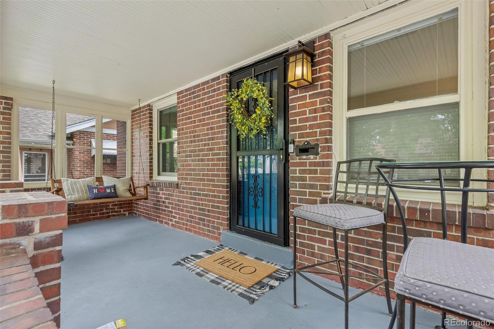 3612 Perry Street Denver, CO 80212 - Photo 4 of 50 a balcony with furniture and large window