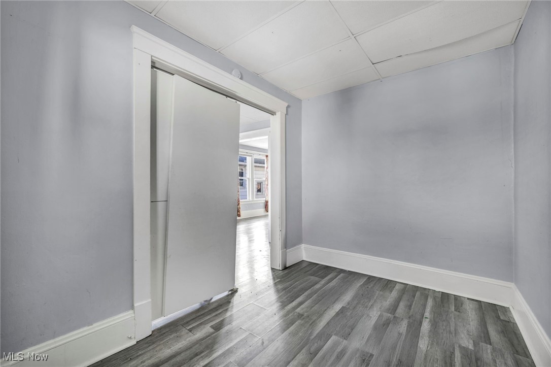3405 Roehl Avenue Cleveland, OH 44109 - Photo 33 of 50 Unfurnished room featuring wood finished floors and baseboards