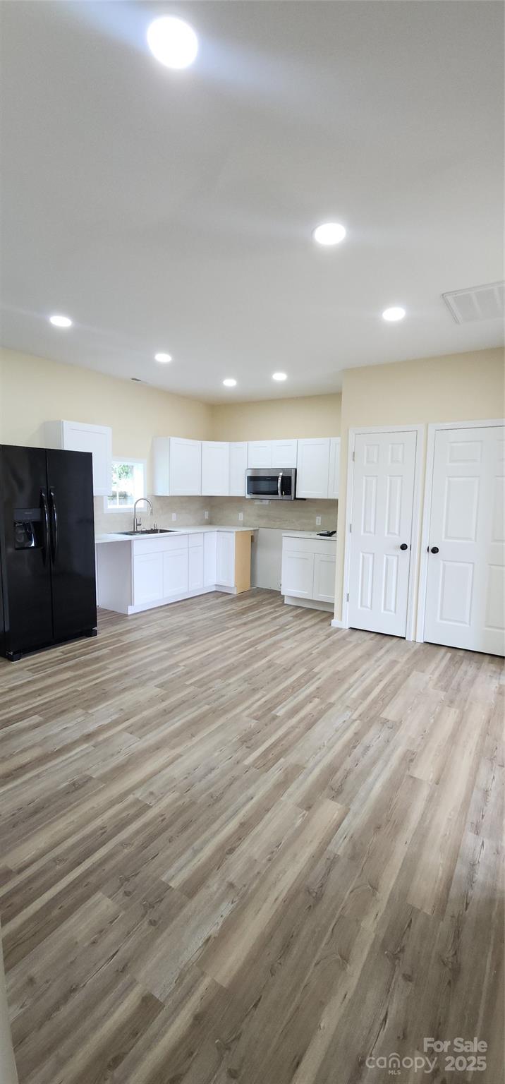 306 Ratchford Avenue Gastonia, NC 28054 - Photo 11 of 28 a view of kitchen and refrigerator
