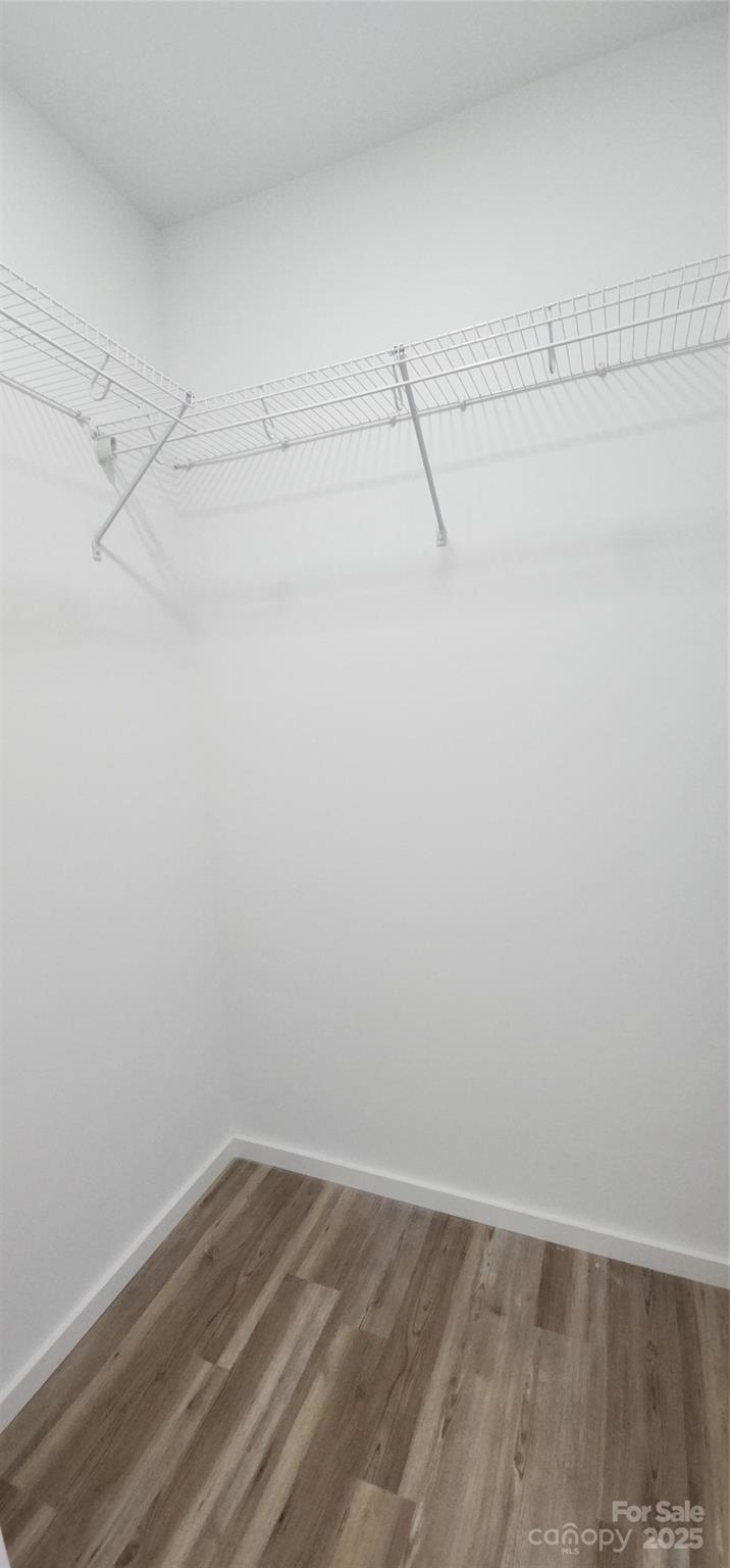 306 Ratchford Avenue Gastonia, NC 28054 - Photo 16 of 28 a view of a room with racks on the wall