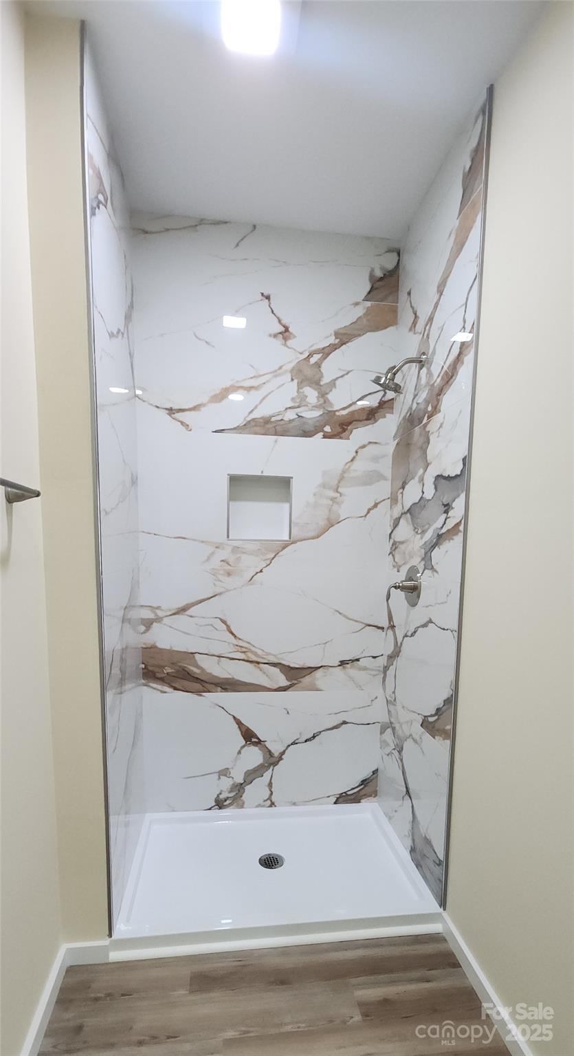 306 Ratchford Avenue Gastonia, NC 28054 - Photo 19 of 28 a bathroom with a bathtub