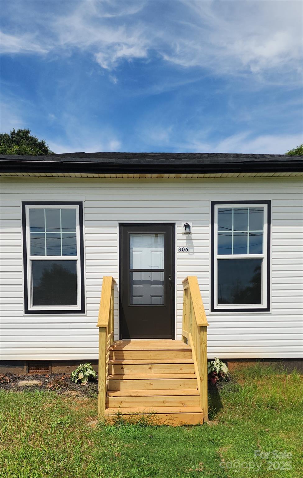306 Ratchford Avenue Gastonia, NC 28054 - Photo 2 of 28 a view of a house with a small yard