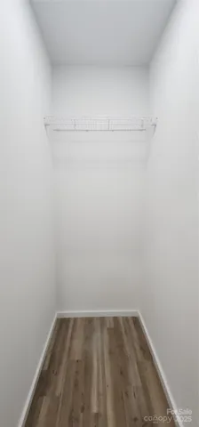 a view of a bathroom with a bathtub and toilet