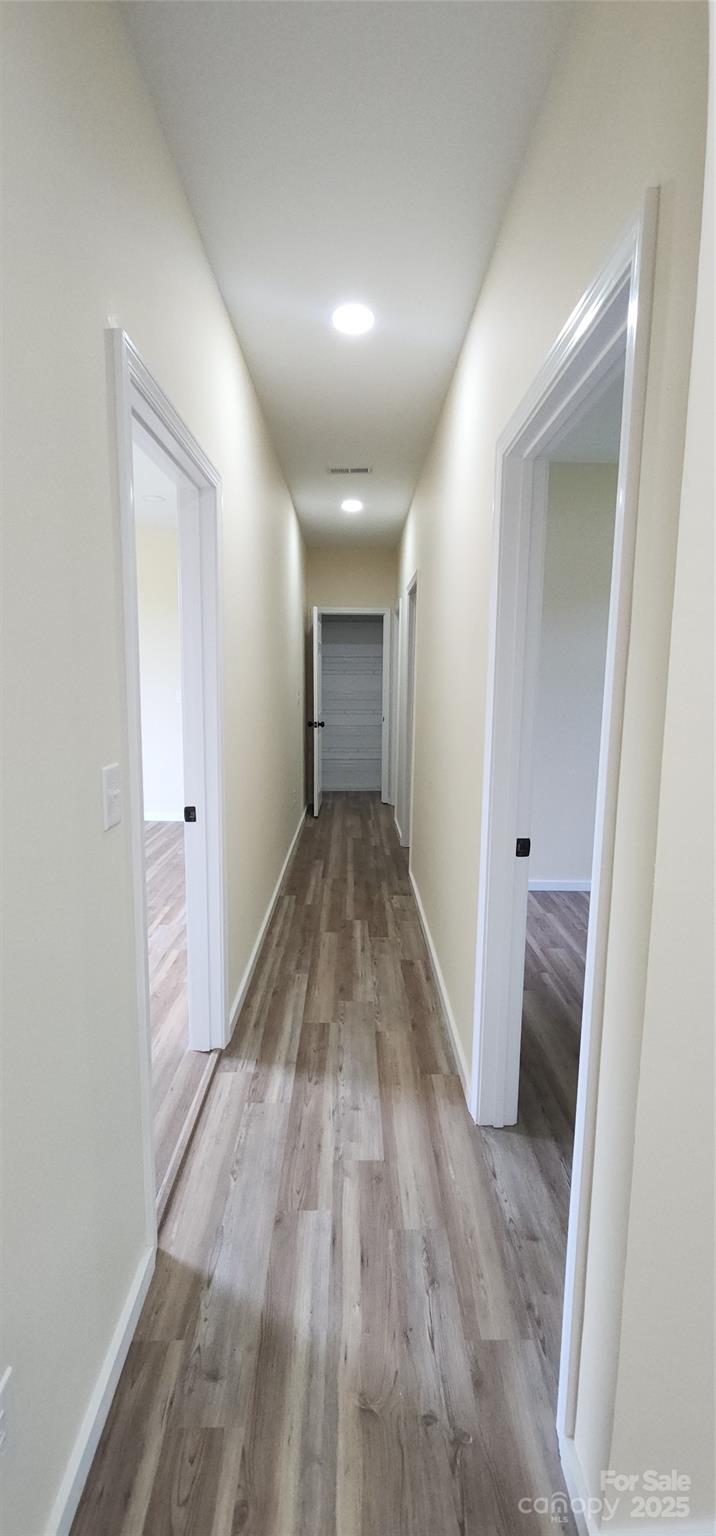 306 Ratchford Avenue Gastonia, NC 28054 - Photo 25 of 28 wooden floor in a room with a window