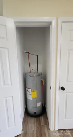 a view of swimming pool from a bathroom