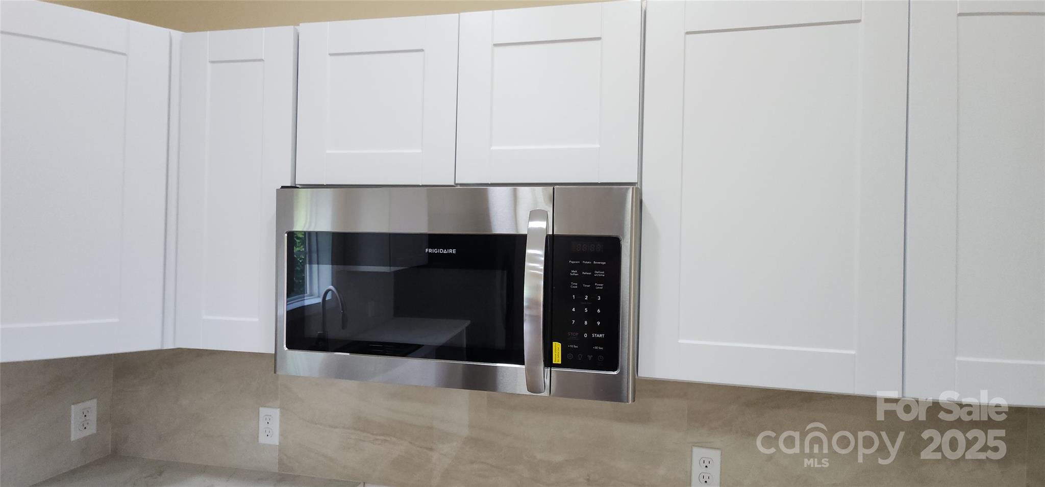 306 Ratchford Avenue Gastonia, NC 28054 - Photo 10 of 28 a living room with a fireplace and a rug