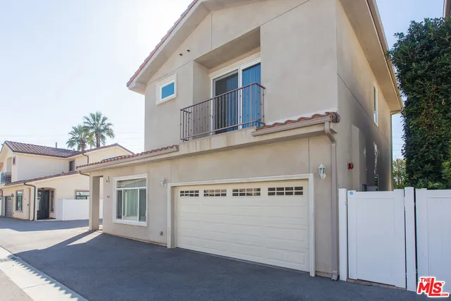 a view of a house with a garage