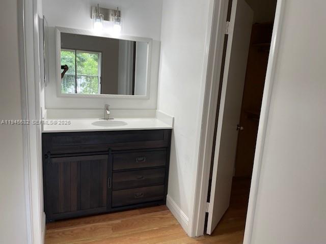 15325 Southwest 106th Terrace, Unit 618 Miami, FL 33196 - Photo 16 of 27 a bathroom with a sink and a mirror