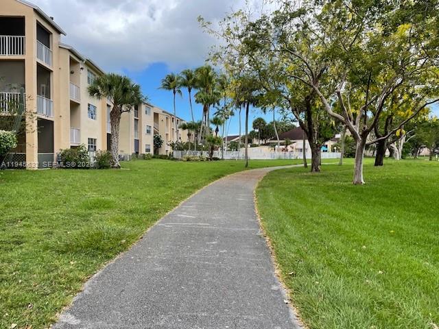 15325 Southwest 106th Terrace, Unit 618 Miami, FL 33196 - Photo 24 of 27 a view of a park with large trees