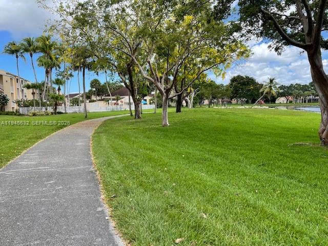 15325 Southwest 106th Terrace, Unit 618 Miami, FL 33196 - Photo 25 of 27 a huge green field with lots of trees
