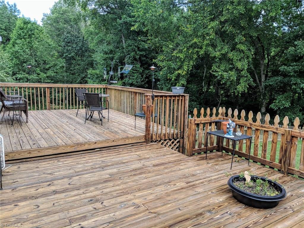 303 Canterbury Road High Point, NC 27262 - Photo 3 of 21 Large Deck overlooking fenced in yard and PRIVATE!!