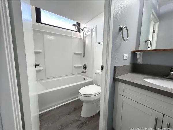 a view of a hallway with washer and dryer
