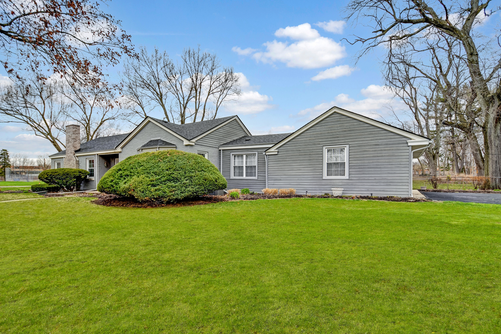 2425 Flossmoor Road Flossmoor, IL 60422 - Photo 19 of 21 a front view of a house with garden