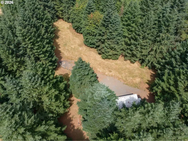a view of a lake view with houses in back