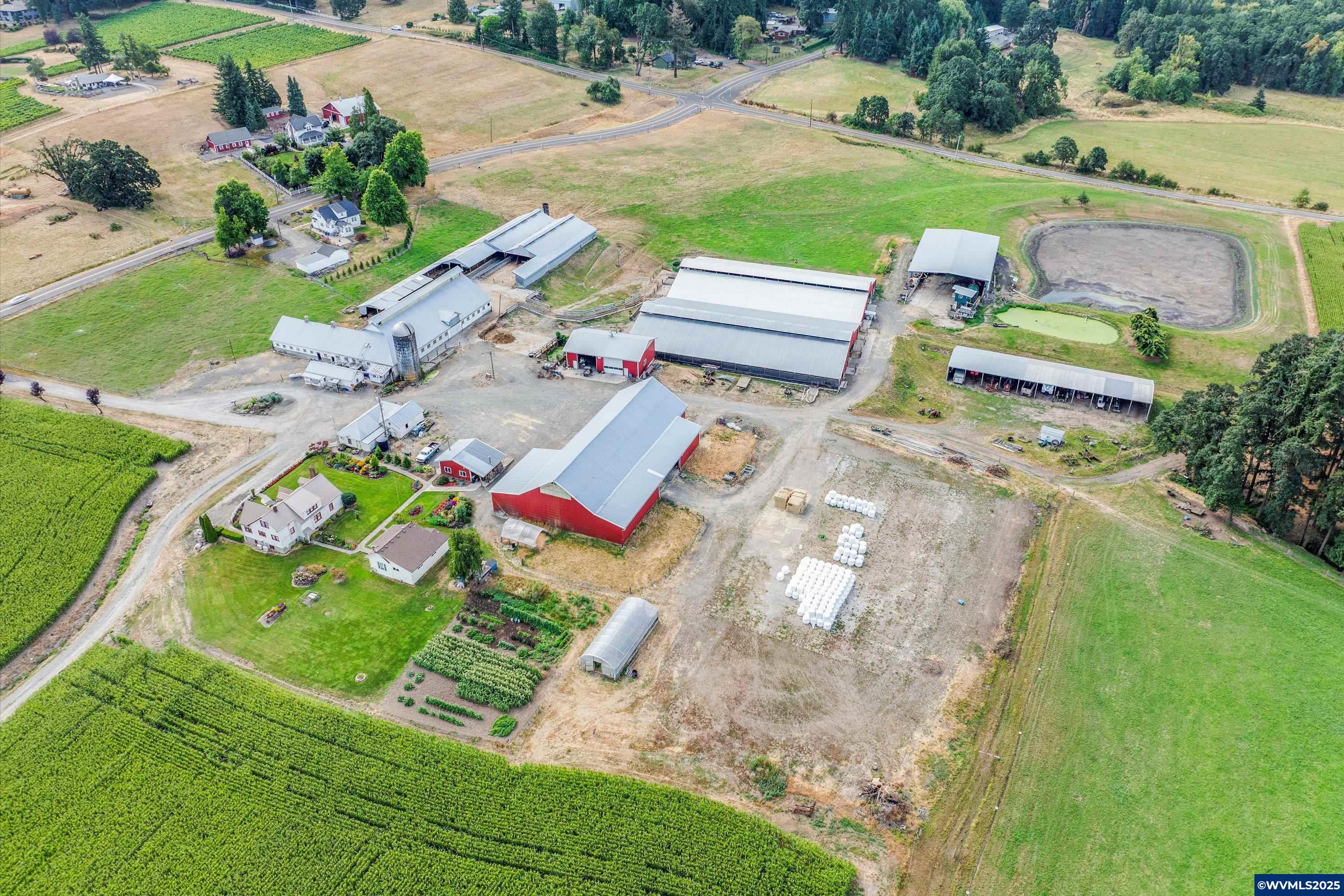21303 South Central Point Road Canby, OR 97013 - Photo 7 of 50 an aerial view of a house with garden