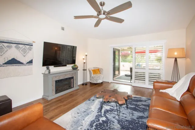 a bed room with furniture and a window