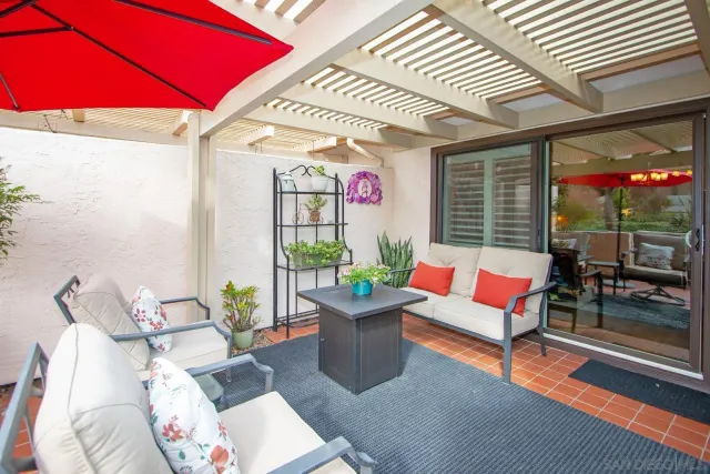 a view of an outdoor space with furniture