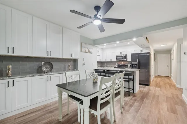 a table and chairs in a kitchen