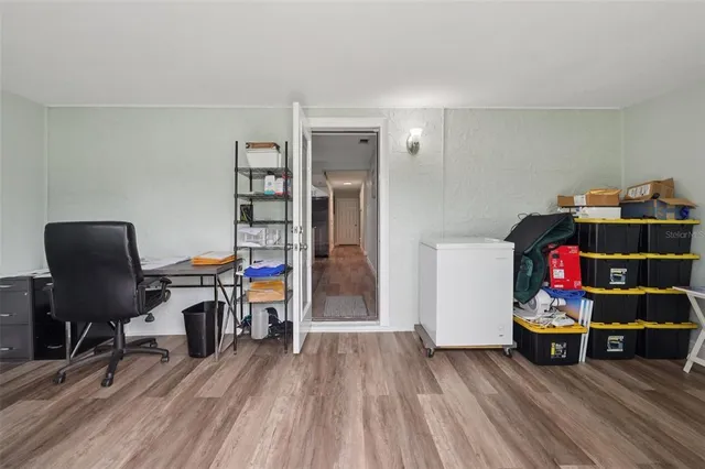 a very nice looking room with a ceiling fan