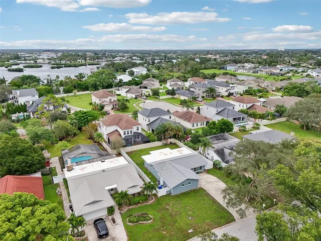 a view of a yard in front of a house with a small yard