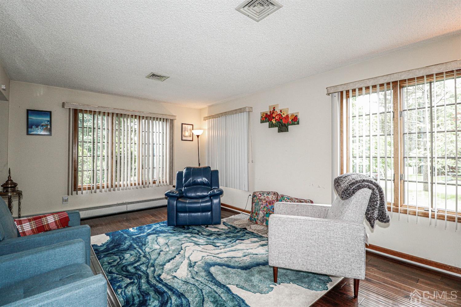 15 Skytop Road Edison, NJ 08820 - Photo 11 of 29 a living room with furniture and a window