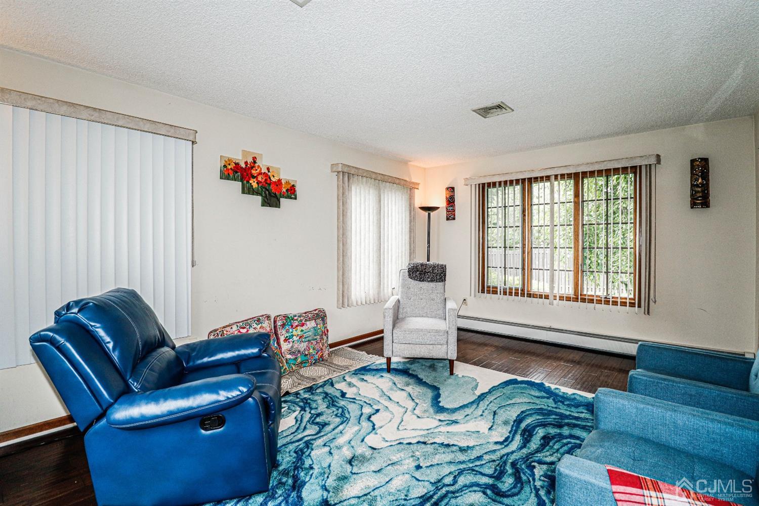 15 Skytop Road Edison, NJ 08820 - Photo 12 of 29 a living room with furniture and a window