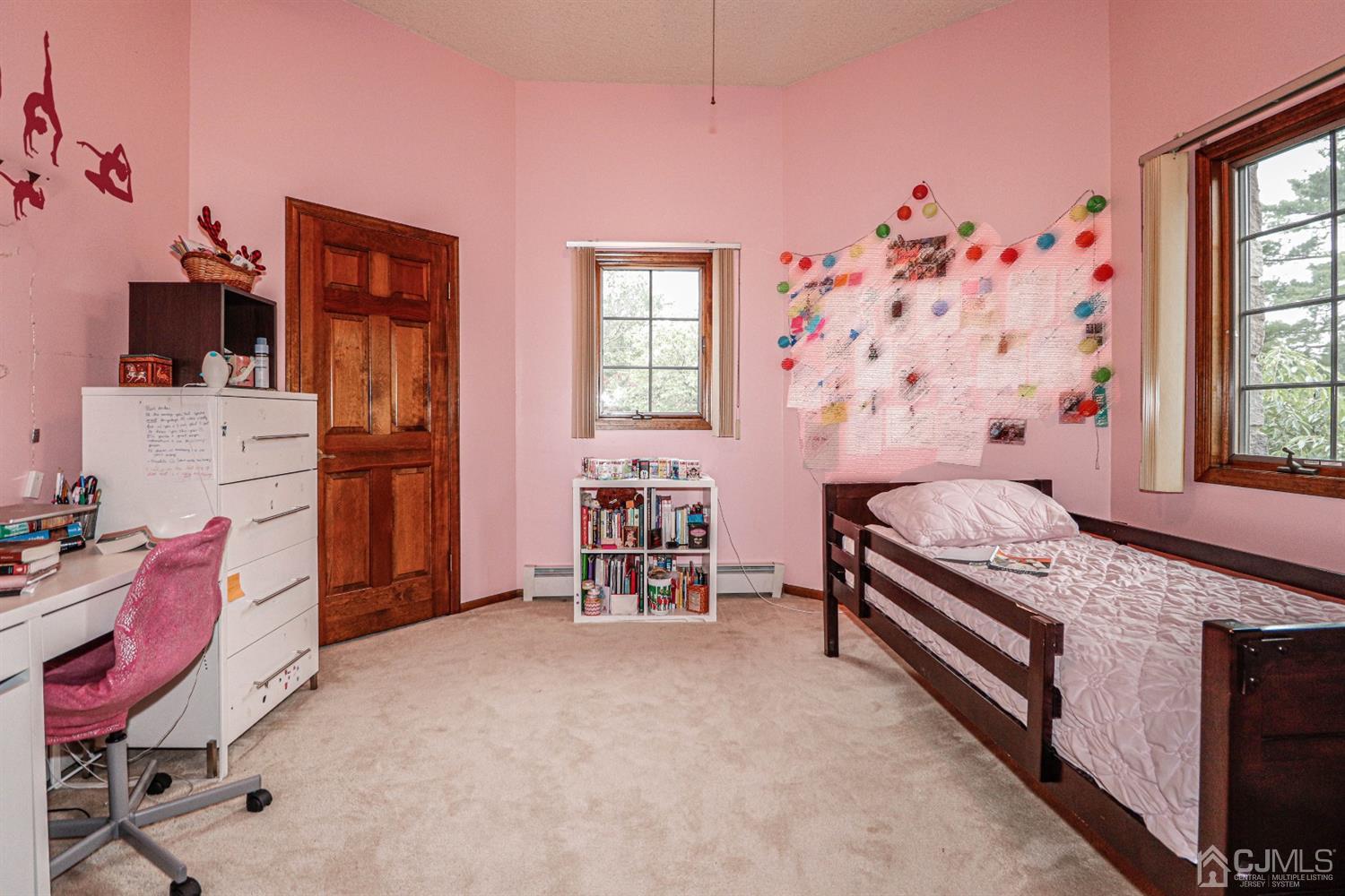 15 Skytop Road Edison, NJ 08820 - Photo 13 of 29 a bedroom with furniture and a window