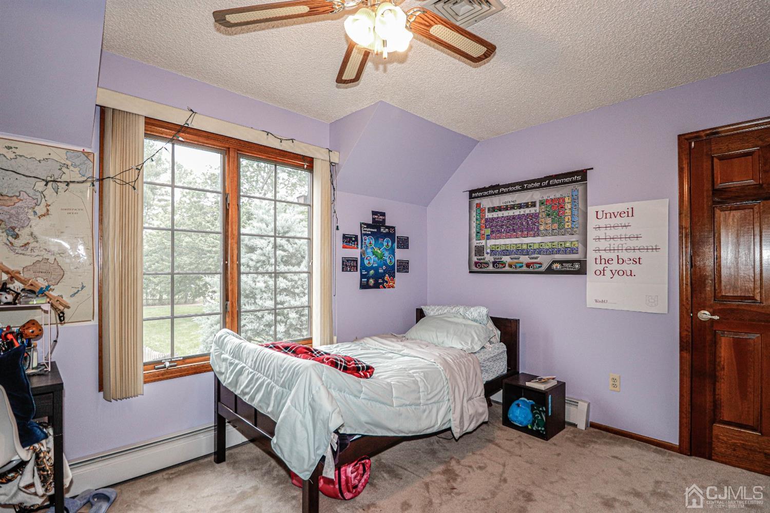 15 Skytop Road Edison, NJ 08820 - Photo 14 of 29 a bedroom with a bed and a chandelier