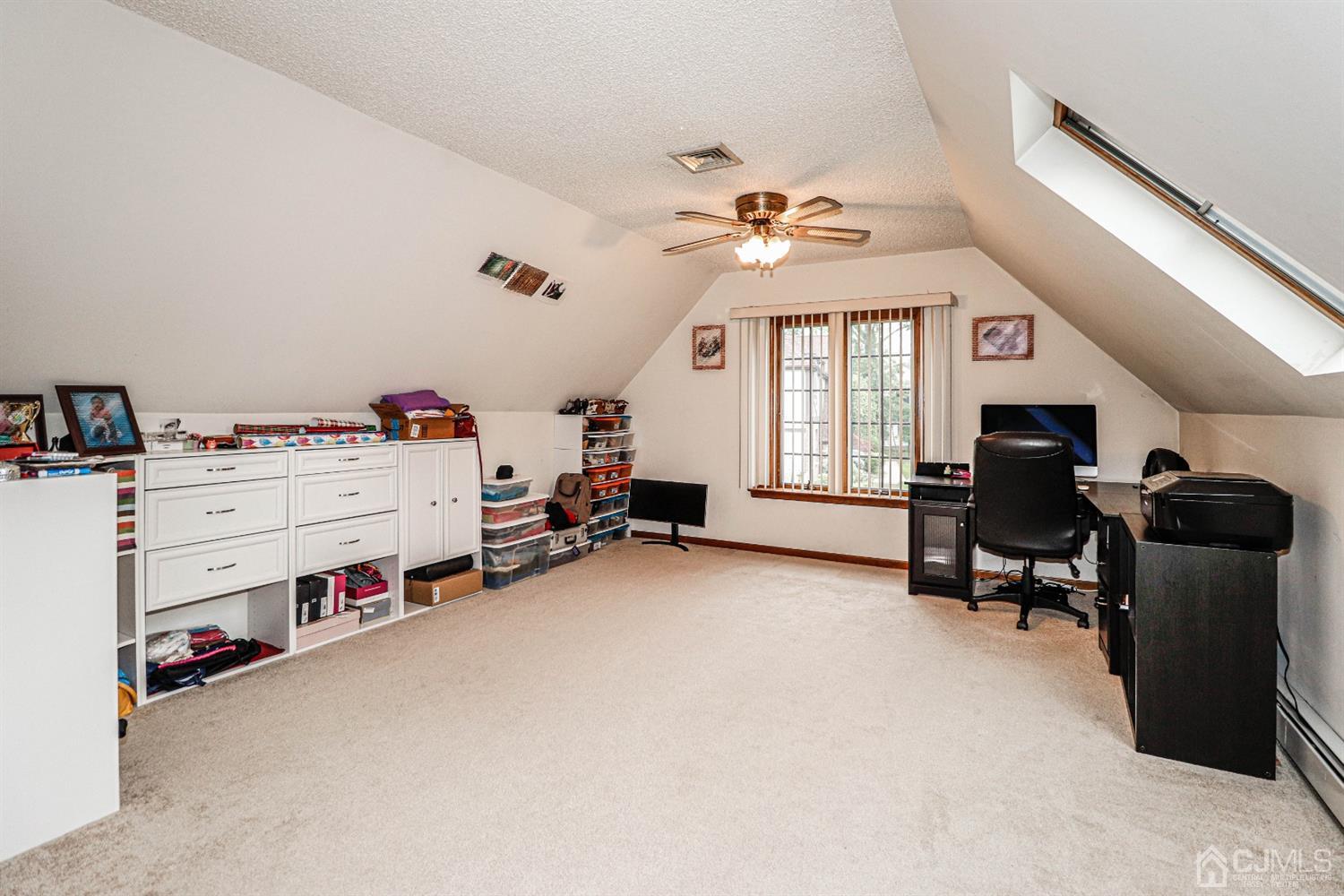 15 Skytop Road Edison, NJ 08820 - Photo 18 of 29 a living room with furniture and a window