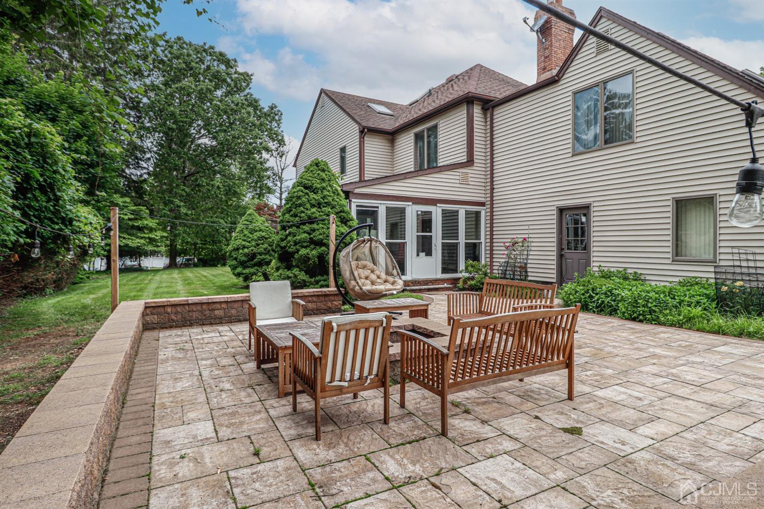 15 Skytop Road Edison, NJ 08820 - Photo 21 of 29 a view of a house with backyard and sitting area