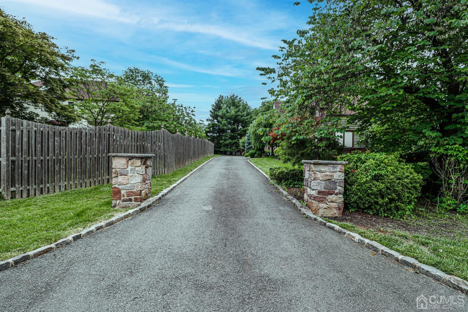 15 Skytop Road Edison, NJ 08820 - Photo 25 of 29 a view of a park with plants and trees