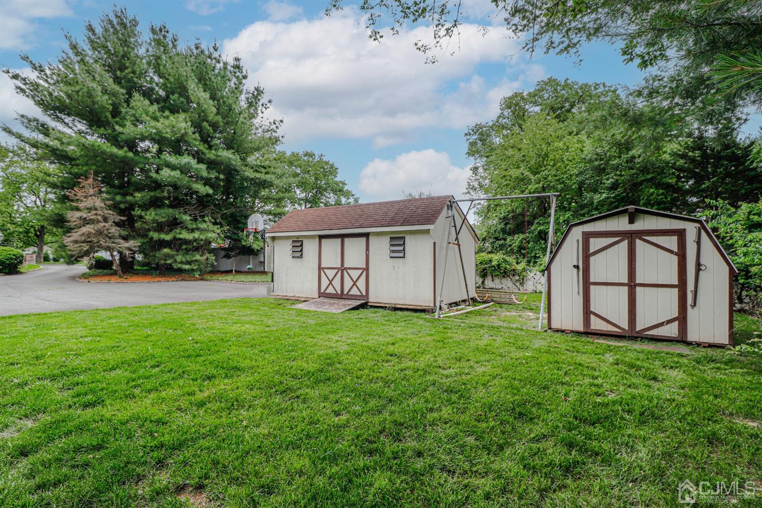 15 Skytop Road Edison, NJ 08820 - Photo 27 of 29 a view of a house with backyard and garden