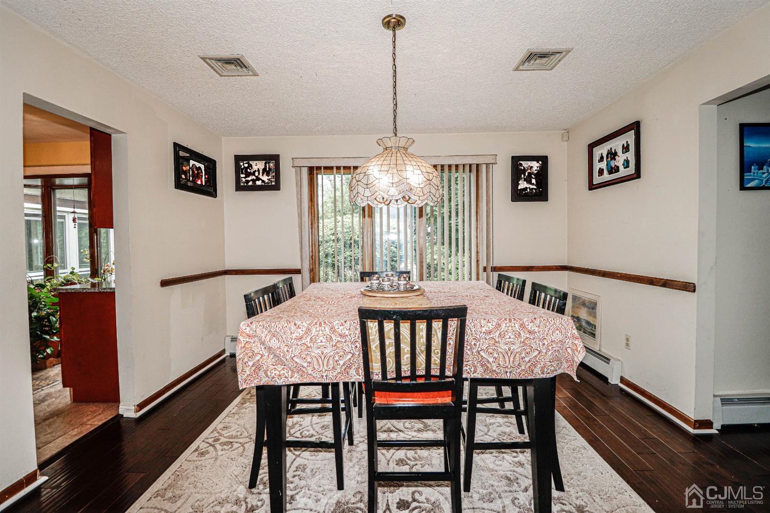 15 Skytop Road Edison, NJ 08820 - Photo 5 of 29 a view of a dining room with furniture window and wooden floor