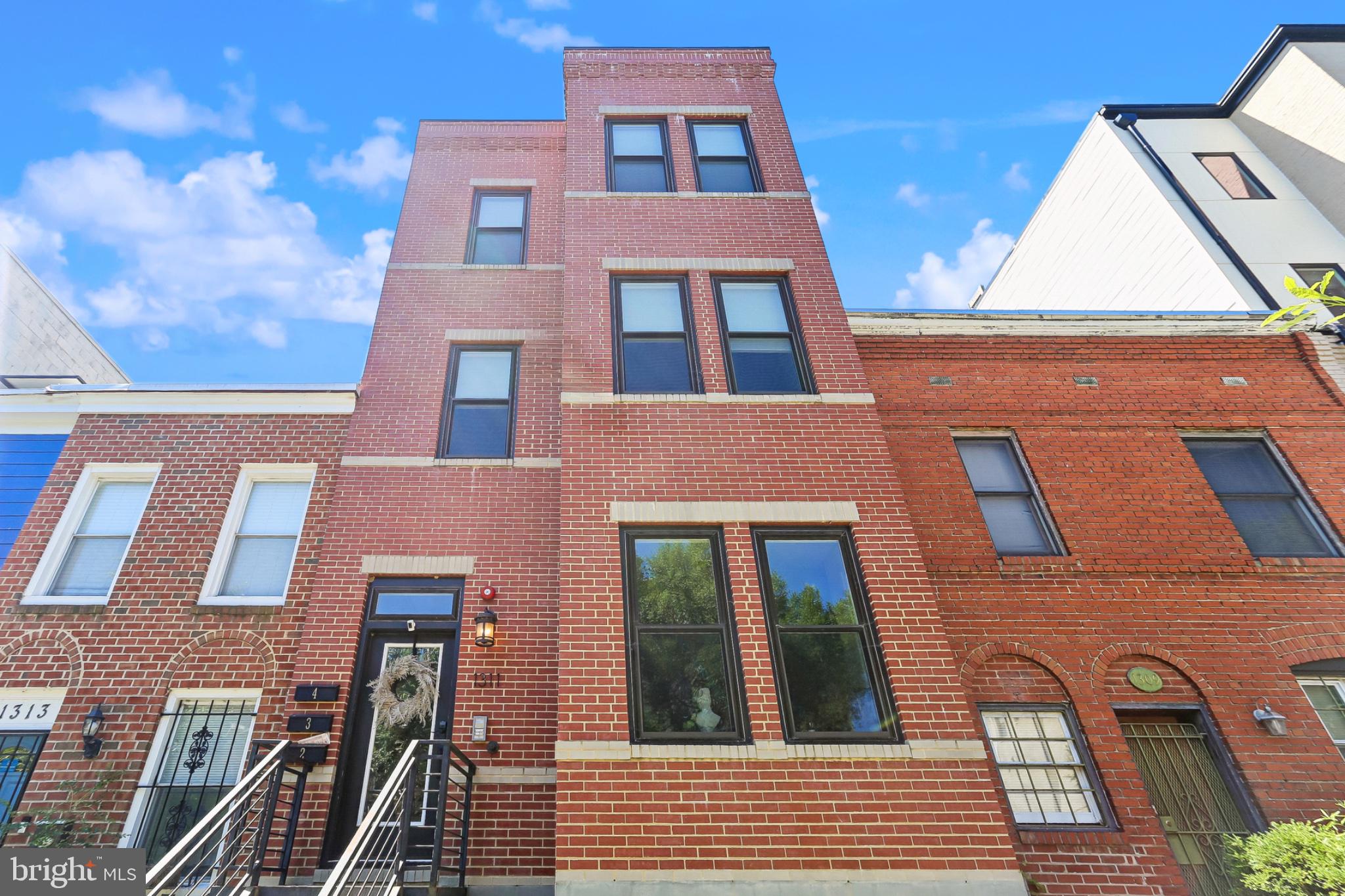1311 K Street Southeast, Unit 1 Washington, DC 20003 - Photo 25 of 33 Handsome brick facade with modern flair.