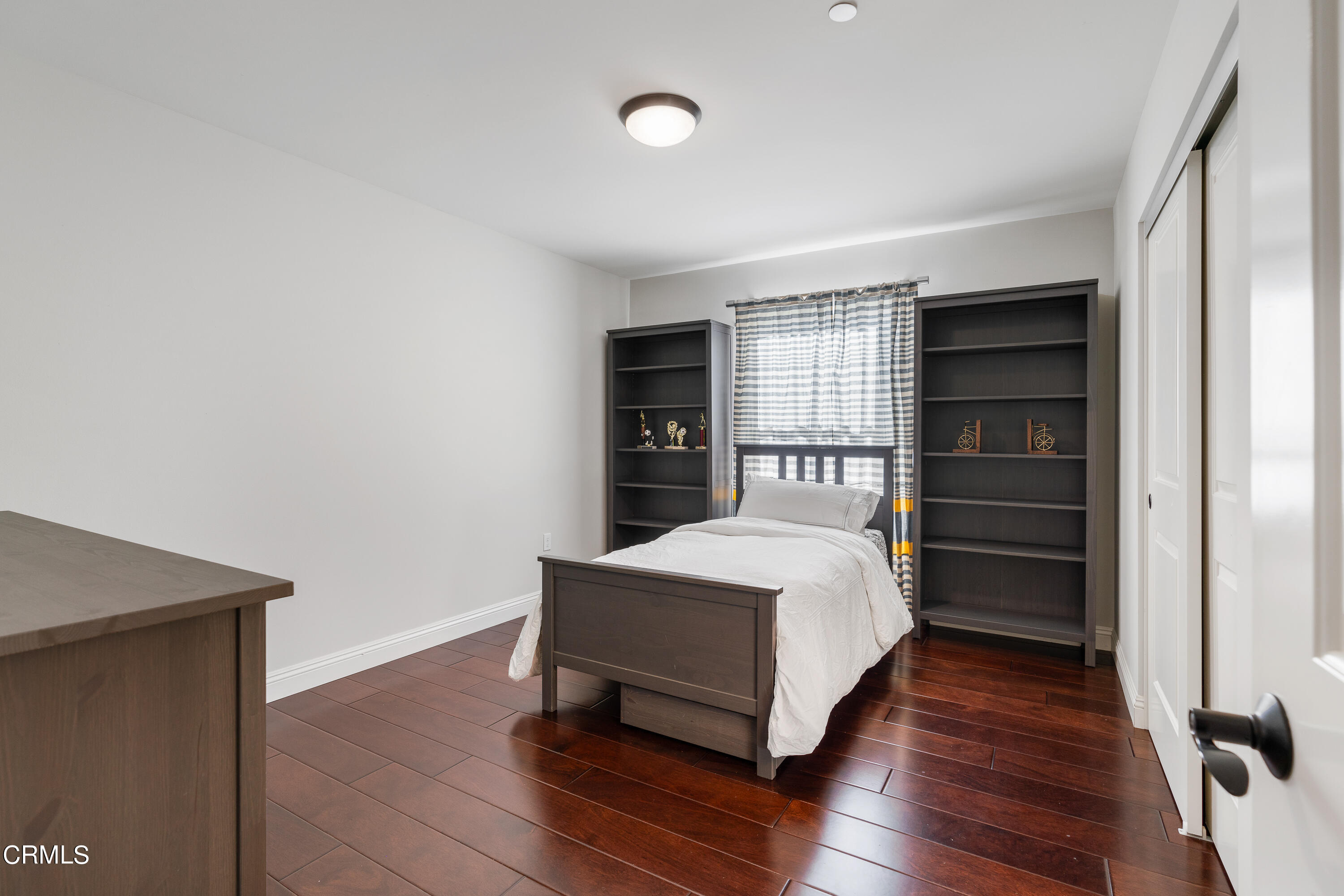 3760 Hampton Road Pasadena, CA 91107 - Photo 12 of 22 a bedroom with a bed and a flat tv screen