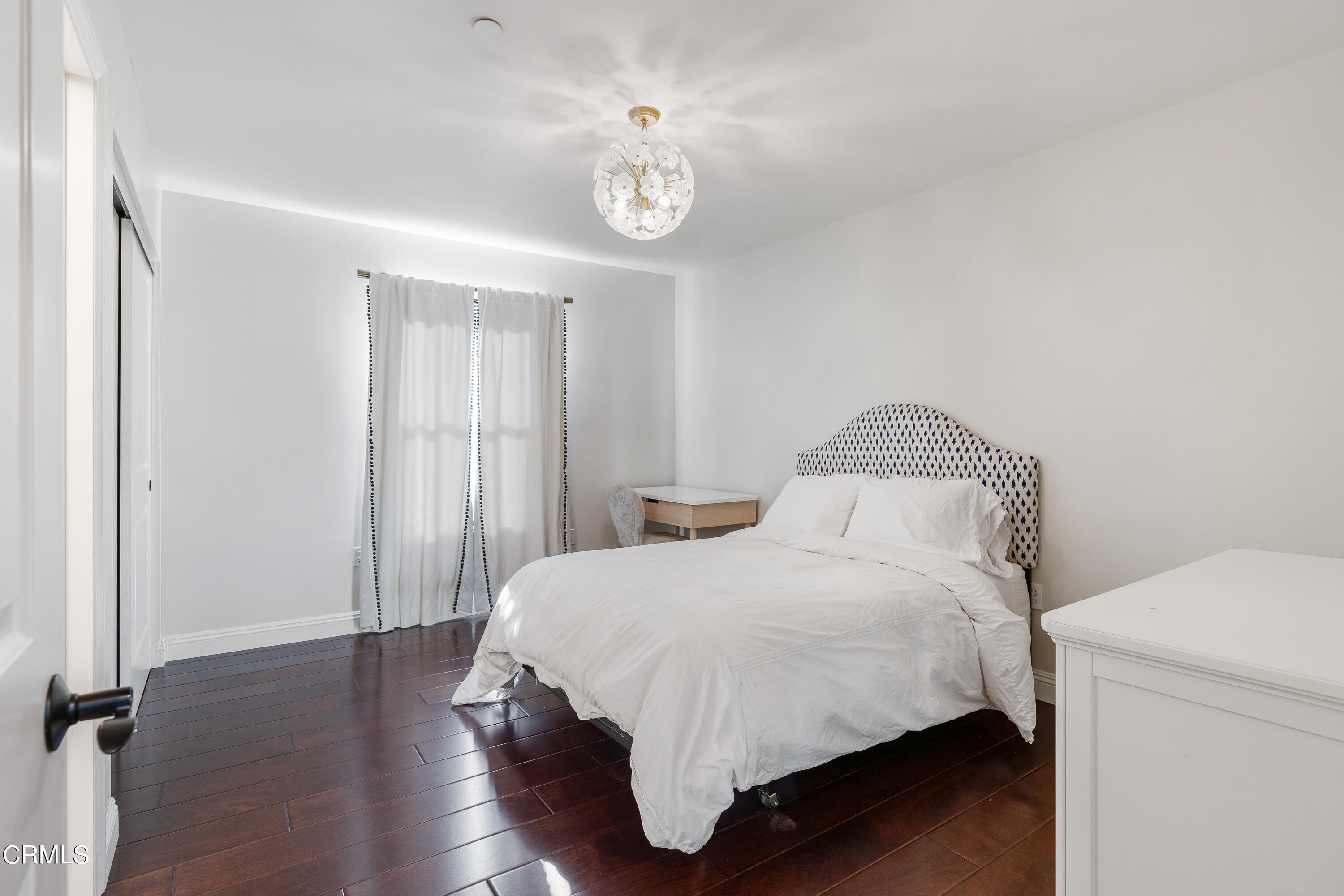 3760 Hampton Road Pasadena, CA 91107 - Photo 13 of 22 a bedroom with a bed and a chandelier