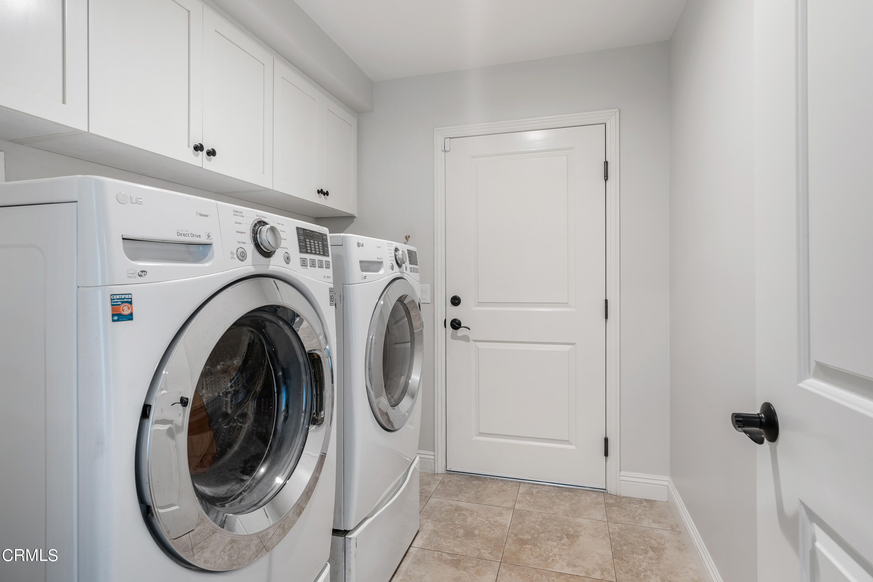 3760 Hampton Road Pasadena, CA 91107 - Photo 19 of 22 a view of a storage & utility room with dryer and washer