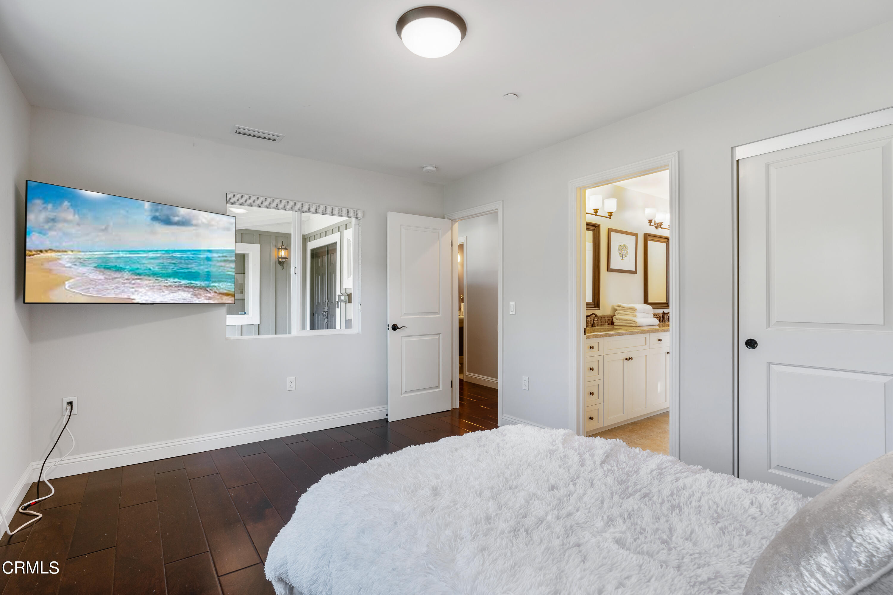 3760 Hampton Road Pasadena, CA 91107 - Photo 10 of 22 a bedroom with a bed and a window