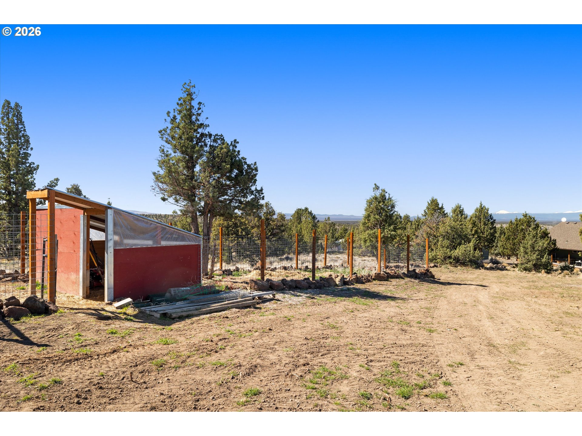 5172 Southeast Oswego Road Prineville, OR 97754 - Photo 45 of 48 a view of a yard with palm trees