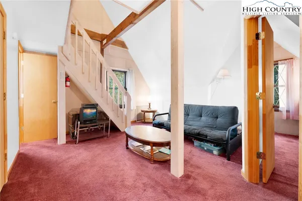 a view of an entryway with front door