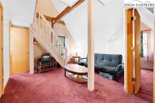 a view of an entryway with front door