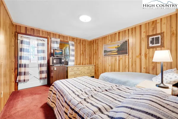 a bathroom with a toilet and a bathtub