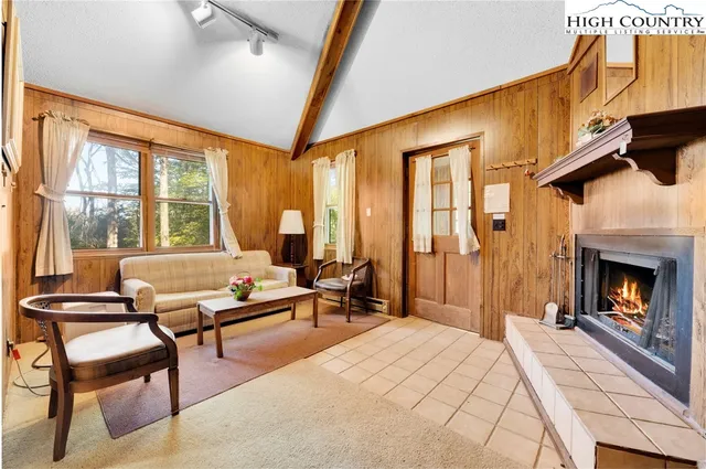 a bedroom with furniture and a closet