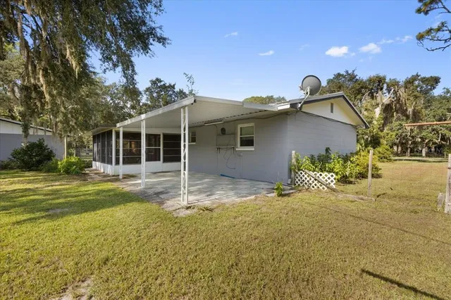a view of a house with a swimming pool