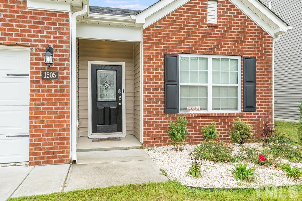 1505 Stark Spring Street Raleigh, NC 27610 - Photo 4 of 22 a front view of a house