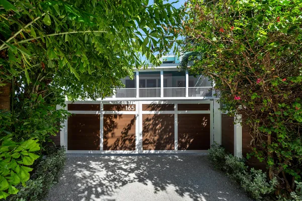 an aerial view of a house with a garden