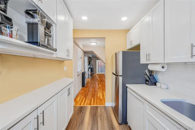 a view of a kitchen cabinets and a kitchen